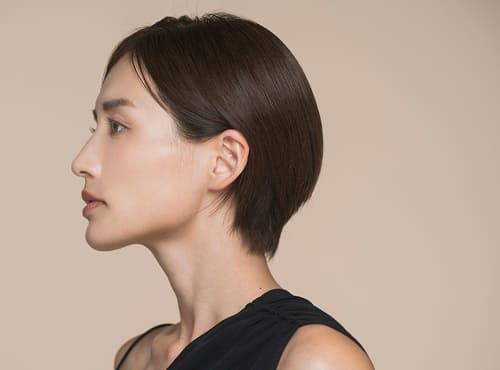 Young woman in profile illustrating XERF treatment guidance for patients in their 20s.